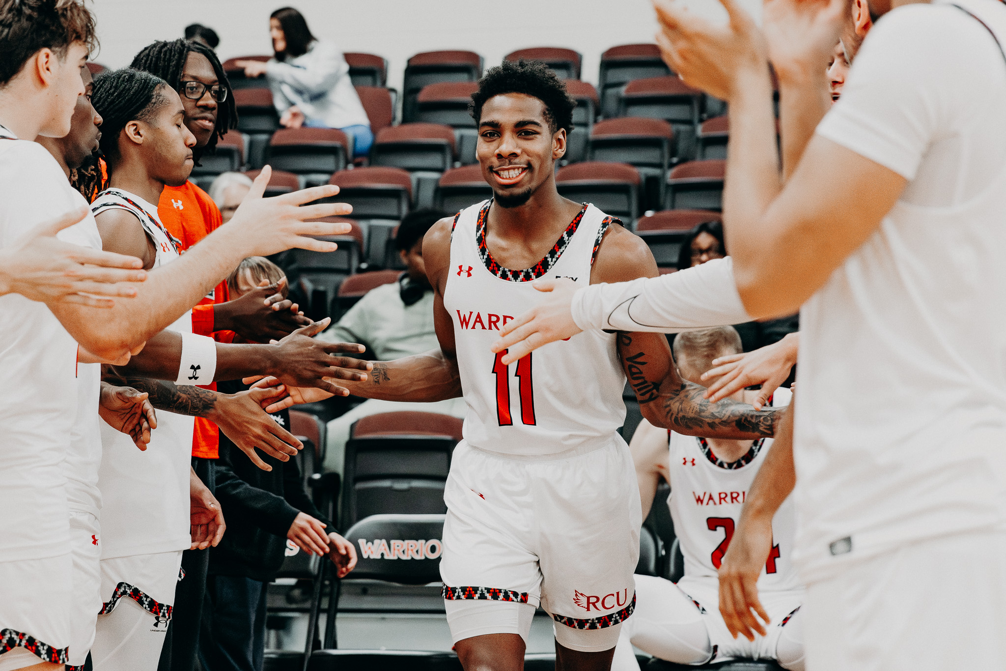 Men's Basketball holds onto win over Saints